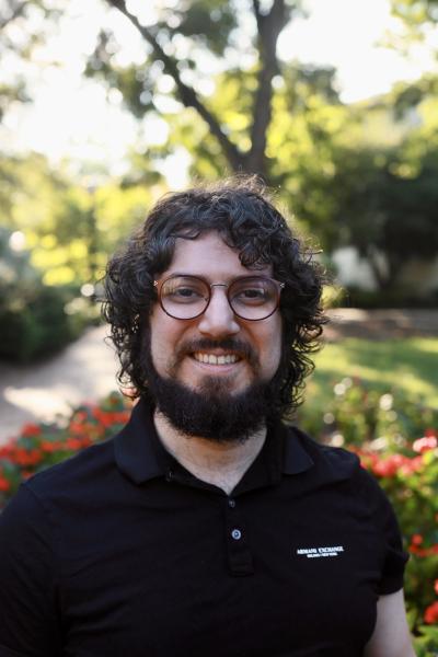 Headshot of a smiling man 