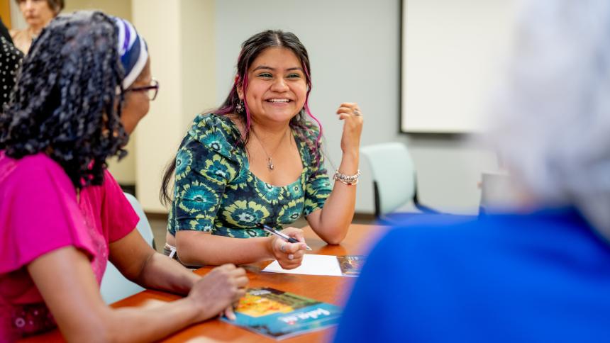 Student talks with faculty