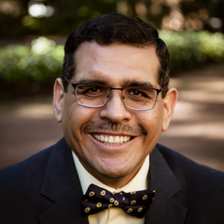 Closely cropped picture of Jorge García-Granados smiling