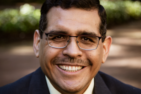 Closely cropped picture of Jorge García-Granados smiling